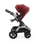 Stokke® Trailz™ All-terrain Stroller with Burgundy Stokke® Stroller Seat Style Kit, $200 at stokke.com

Norwegian purveyor of children's furniture and equipment Stokke released two new fall-inspired Style Kits—burgundy, seen here, and olive—for its strollers. The kits include a hood with visor, a rear textile cover, and a seat reail cover. All are compatible with numerous Stokke trailers, including the Stokke Trailz™ chassis ($1,299) seen here. The kits, as well as the large storage unit underneath, are waterproof.
