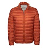 Tumi Pax Patrol Packable Travel Puffer Jacket, $195 from tumi.com

Tumi's versatile water-resistant jacket packs a surprise: an inflatable travel pillow hidden in its collar. Its simple, minimal design lends itself to a wide range of social settings while its down insulation will keep you warm. Seen here in the mandarine color, it's also available in silver gray, navy blue, and black, from sizes small to XXL.