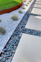 Permeable hardscaping retains moisture and helps reduce the need for watering.