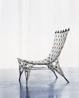 This Knotted chair (1996) is a 1:6 model version, produced by Vitra, and is only a few inches high. Its larger relatives—produced by Cappellini—have already found their way into a number of museum collections.