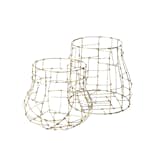 Artist and designer Rodger Stevens created a series of wire baskets for the studio.