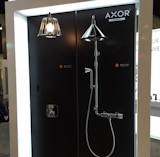 Head to the @hansgroheusa booth to check out and test shower heads like the Axor line.