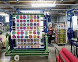 Designers Maija Louekari's Lappuliisa fabric is cut and rolled into bolts. Follow us as we step inside Marimekko’s printing factory for a look at how its iconic textiles come to life.