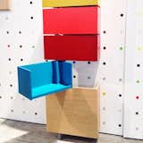 An ingenious solution to wall storage: Sculptures Jeux's hinged shelves that can be rotated open or closed.