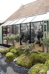 The structure's minimalist shape and "timeless" framework gave the brothers freedom to explore different concepts by changing the colors, finishes, and decoration. It's constructed from glass and white pine. "The airy quality of these two materials—along with many windows—was critical to the design," says Peart. "Architecture has always been an integral part of our inspiration and direction. The intention of the Alpine Lodge is to convey timelessness, classic style, and thoughtful utility, mirroring our objective when designing WANT Les Essentiels de la Vie products."