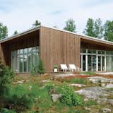 An Asymmetrical Prefab Home in Sweden

It took a mere six months—three in the factory and three on-site—for this prefab to come to fruition on the shore of Sweden’s Müsko Island.