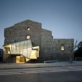 In the Catalan town of Santpedor, architect David Closes intervened on the remnants of a derelict Franciscan convent to create a modern auditorium.  Photo 18 of 21 in You Won't Believe That These Incredible Modern Buildings are Chapels and Synagogues