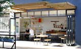 Here's the cafe's front at 66 Albert Road in Woodstock. The studio's Fairlegs tables and benches outfit the space.  Photo 7 of 7 in Coffee Break: Cape Town’s Field Offices by Diana Budds