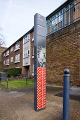 Red, banner-like patterns decorate a map in Stockwell. Photo by hat-trick design.  Photo 5 of 7 in Projectile Motion: Hat-Trick Design’s Stockwell Project Bring Local Art to Wayfinding