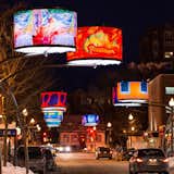 The lampshades feature reproductions of works by a pair of Québécois artists, Alfred Pellan and Fernand Leduc, from the permanent collection of the Musée National des Beaux-Arts du Québéc.  Photo 2 of 6 in An LED Light Display Takes Over an Avenue in Quebec City