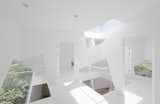 A series of square cut-outs at varying angles creates similar-yet-unexpected geometric voids that connect each of the rooms in this vacation home on Japan's Boso Peninsula. Designed by Yuusuke Karasawa, the home's complex interior belies its orderly cube exterior facade.