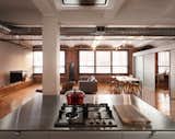 The building was built in 1910. "It’s a pretty raw space with rough exposed brick, barrel vaulted ceilings, original hardwoods, and exposed ducting," Greenawalt says. "We tried to use industrial materials—stainless steel, perforated steel, brick—in a more refined way for the kitchen."