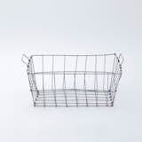 This Market Basket from designer Yumiko Sekine is roomy and accommodating, and is designed to fit up to size A4 paper if used on a desk or in an office. The versatile basket can be used in myriad ways, from holding cloth napkins or kitchen accessories, organizing bathroom products, storing magazines in a living room, or even to hold slippers at an entryway or bedside.