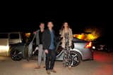 NORM designer and architect Kasper Rønn, shft.com founder Peter Glatzer, and Maria Margarita Chon exit a Volvo S60 as they arrive at the Marmol Radziner Desert Prefab for dinner.
