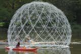 The firm and its team of volunteers fabricated the Buckminster Fuller–esque dome out of 450 recycled umbrellas.