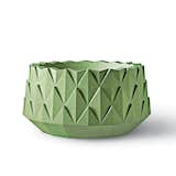 Agave Series planter by Kornegay Design, price upon request 

The round, concrete landscape planter is finished with a raised geometric motif and a raw, sandblasted finish.  Photo 3 of 13 in Furnishings in Outdoor-Friendly Materials by Kelsey Keith