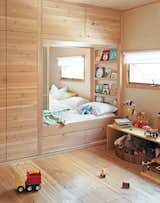 Only a set of sliding doors separates the kids’ room from the master bedroom in a Toronto, Ontario, home. When the time is right, there's a track inlaid in the ceiling for a four-panel bifold wall to divide the space into two private rooms for the children. 

Read the whole story here.