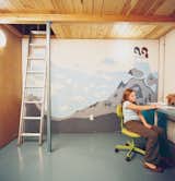 Eve works at the desk in her double-height bedroom. Vogt’s mythically aquatic-themed mural reflects both the taste of a young girl and the pared-back aesthetic of any modern enthusiast.