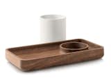 The most challenging aspect of the design was bringing together the wood and plastic, Pfeiffer says. "The intersection of these two dissimilar materials requires tight tolerances between two materials that move at very differently rates. It took some time to getting this right!" The cup on the Catch All Tray ($45) can be used atop the tray or removed to reveal a spot to corral smaller items.