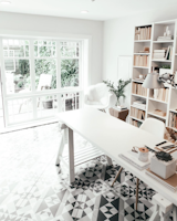 @andrea_mclean took a garage in Vancouver and turned it into a minimalist work area. The designer credits the geometric tile and reclaimed windows for making the space pop.&nbsp;