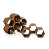Hexa Stacking Wine Rack

This modular counter top wine storage unit is made of walnut veneer and, like a beehive, can pack a multitude of storage nooks into a small space.  Photo 1 of 7 in Essentials for the Modern Bar by Jacqueline Leahy