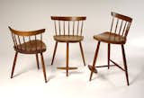 These three-legged chairs were designed in 1950 for George’s daughter, Mira, who now runs George Nakashima Woodworker, the company that carries on the Nakashima legacy.