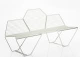 Casamania's Hexagon bench from 2011 in pre-galvanized metal seats three. It's suitable for outdoor use and comes in three colorways.