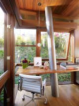 Office, Desk, and Study Room Type Materials and craft play a significant role inside and out. The columns are Type 316 stainless steel – almost nautical grade. Floors and walls are walnut; windows are mahogany.  Photo 7 of 11 in An Atypical Tree House