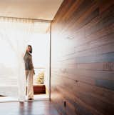 Doors and Exterior The Mariscals' bedroom opens out onto a small triangular patio. The exterior's ipe cladding also makes up the walls and floor of the master bedroom, further inviting the outside in.  Photo 7 of 7 in Sebastian Mariscal's Wood Architecture from Double the Pleasure