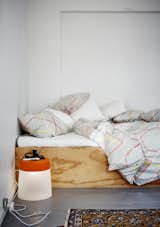 Danish textile designer Margrethe Odgaard's duvet cover set ($49.99 for three pieces) is paired with Rich Brilliant Willing's indoor/outdoor LED stool lamp ($69.99).  Search “theo richardson of rich brilliant willing” from Ikea Furniture Designed for Small Spaces