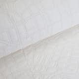 Although from afar this ivory quilt looks simple, up close, the quilt has detailed neighborhoods like New York City’s Battery Park and Los Angeles’s Studio City. Available at the Dwell Store, $450