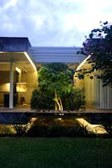 A wider view of the bridge that "will strengthen the floating concept of this house," according to Wibowo.  Photo 5 of 12 in Bridging Old & New in Indonesia by Jaime Gillin from Modern Homes Built Around Trees