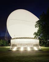 2006: Rem Koolhaas and Cecil Balmond, with Arup

This massive, egg-shaped orb, like a blimp about to achieve flight, lit up Kensington Park during the summer of 2006, with a roof that literally floated free of the main structure. The structure played host to an array of event and live broadcasts, including a day-long discussion featuring Koolhaas dishing with leading designers, philosophers and filmmakers about the hidden levels of London.

Photograph © 2006 John Offenbach