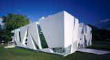 2002: Toyo Ito and Cecil Balmond, with Arup

A mathematical equation rendered in space, this intriguing white cube, and the maze of open space, razor-sharp lines and polygons, was devised from the algorithms of a cube.

Photograph © 2002 Sylvain Deleu