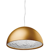 The soft gold sheen of Marcel Wanders' Skygarden pendant for Flos exudes warmth even when the lights are out. Available through the Dwell store, the pendant light has a white plaster photo-etched frieze inside of its shade.