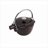 Enameled cast iron with a stainless steel handle, the Aubergine Round Teapot is pictured above in an eggplant hue. Made by Staub in France, the teapot is a durable design classic, seamlessly making the move from stove to table.