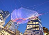 Janet Echelman’s “Skies Painted with Unnumbered Sparks”

Created to celebrate the 30th anniversary of the TED Conference and only up from March 15-22, the web of netting suspended between the Fairmont Waterfront and the Vancouver Convention Center was a wonder. Echelman says her work is, in part inspired by the idea of “feeling sheltered, but connected to the limitless sky,” and the crowds that gathered and interacted seemed to feel similarly inspired.

Credit: Ema Peter  Photo 1 of 4 in Sculpture Lets the Public Paint the Sky