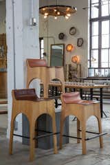One of our favorite finds at the showroom, custom leather and wood barstools.