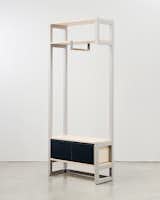 Knauf and Brown's 9x9 furniture system contains a desk, two wardrobe units, and a multi-purpose sidetable.