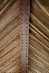 Sap wood is joined on a bias, creating a geometric pattern on the ceiling.