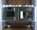 Among the sleek kitchen displays is an Ernestomeda Icon kitchen cabinet with Gaggenau coffee and combination oven system.