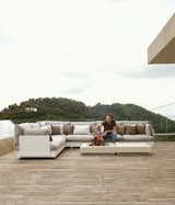 Life at the Plane House is all about relaxing and hanging out with friends for co-owner and Athenian Achilleas Mourtzouchos. Here he does a bit of lounge-side grilling on a modular Pure seating system by Viteo. Even the fire table and grill are part of the Austrian outdoor furniture company’s line.