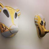 Masks by Jaime Hayon, glimpsed in Ventura Lambrate.