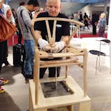 Carl Hansen & Søn show how the seat is woven on a Hans Wegner Wishbone chair.  Photo 1 of 8 in Milan Design Week: Day Three