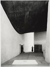 The chapel of Notre Dame du Haut in Ronchamp, France, designed by Le Corbusier and photographed in 1955. Gelatin silver print. Carnegie Museum of Art, Purchase: gift of the Drue Heinz Trust. Image courtesy of the Carnegie Museum of Art, copyright Ezra Stoller/Esto, Yossi Milo Gallery.