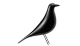 The Eames House Bird is made of solid alder with a black lacquer finish and steel wire legs. Image courtesy of Vitra.