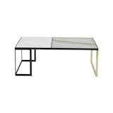 The Hialeah Glass Top Coffee Table explores the possibilities of materials. The table is available with two different types of glass—clear and bronze—as well as with solid white oak or luxe Carrera marble within the tabletop. Shown here, the marble and clear glass table also features brass-plated steel and powder-coated aluminum legs.