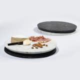 Handcrafted in Chicago, the Doppio Serving Tray from Felicia Ferrone is a centerpiece, serving board, and tray, all in one elegant design. Comprised of two sides—one in white Carrera marble and the other in black Nero Marquina, the Doppio Serving Tray can be used to present cheeses and charcuterie, showcase candles or flowers, or can be used as a serving tray for cocktails or snacks.