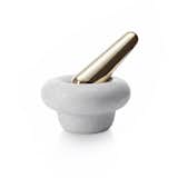 Hours of grinding in Tom Dixon's London restaurant resulted in this weighty block of white Morwad marble and brass to smash, pummel and grind spices and herbs. An exaggerated rounded lip allows you a firm grip as you work, while the brass pestle gives a luxurious shine.