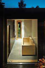 Sævik designed the wood tub in the bathroom, which features an adjacent sauna. The Inxx A5 faucet is by Mora.